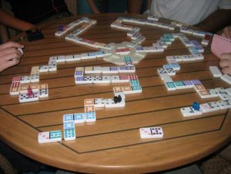Dominoes;  The Game of Champions ~ So many dots, so little time.