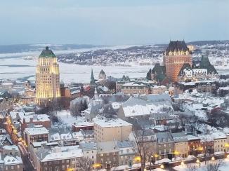 Old Quebec City ~ A view from my hotel room.  You can see the St. Lawrence Seaway.  Straight ahead is the L'Le D'Orleans, and island in the middle of the seaway.  The south leg of the seaway is visible.  The Notre-Dame de Québec Basilica-Cathedral is the small dome in the middle of the photo, with the Fairmont Le Château Frontenac Hotel to the right, and the Caisse-Depot & Placement to the left.  (I think I have those buildings labeled correctly.)