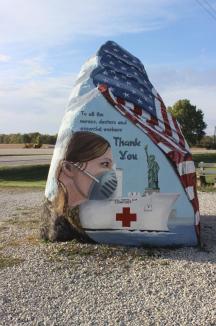 Freedom Rock ~ The Freedom Rock (also known as the Patriotic Rock) is a 12-foot-tall (3.7 m) boulder located along Iowa Highway 25 near Menlo in western Iowa approximately one mile (1.6 km) south of exit 86 on Interstate 80. The boulder weighs approximately 56 short tons (51 t; 50 long tons).

The rock is located on private property and was used for graffiti. Since 1999, however, it is repainted every year in time for Memorial Day with the purpose of thanking U.S. veterans and their families for their military service and sacrifice. The rock is painted by Ray "Bubba" Sorensen II from Greenfield.  Sorensen is not commissioned or paid to paint The Free...