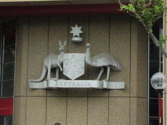 An Australia sign at Sydney ~   This sign shows a kangeroo and an emu bird.  