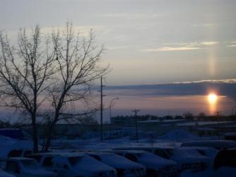 Sunset over Bismarck ~  2010: February 1st sunset over a frigid Bismarck, North Dakota. Taken from the Rimrock Trailways bus. 